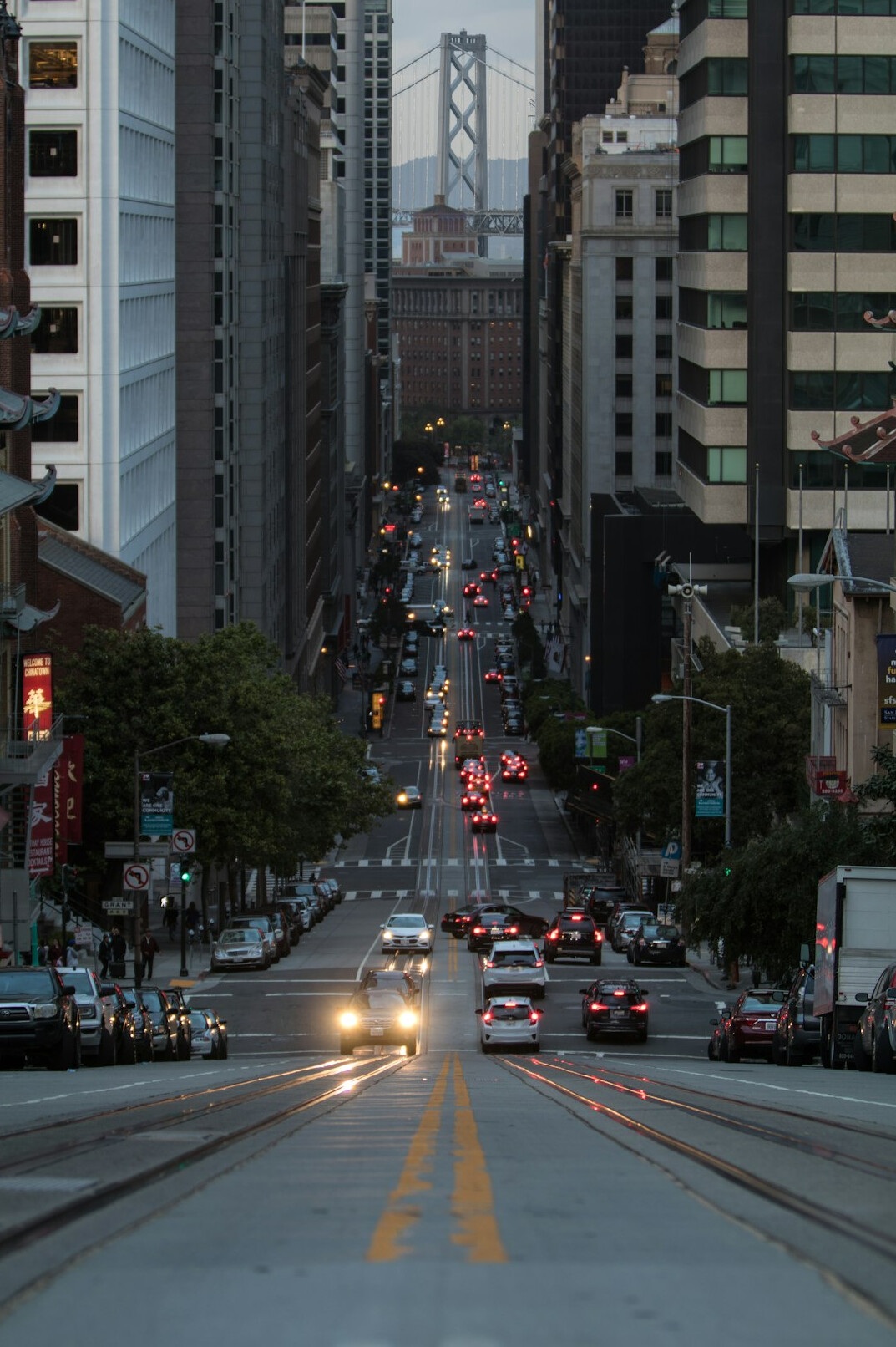 City street at dusk with buildings